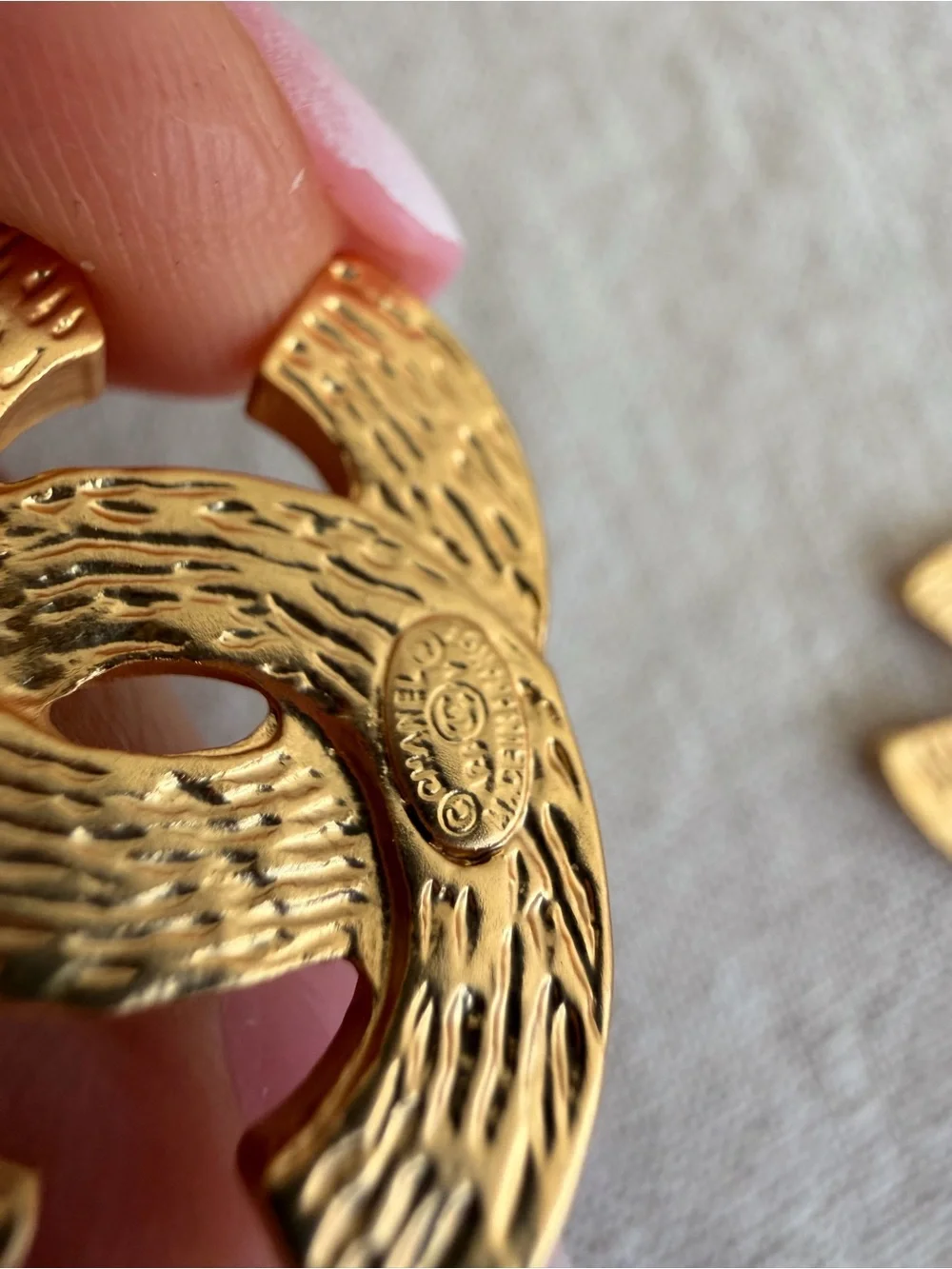 CHANEL gold tone